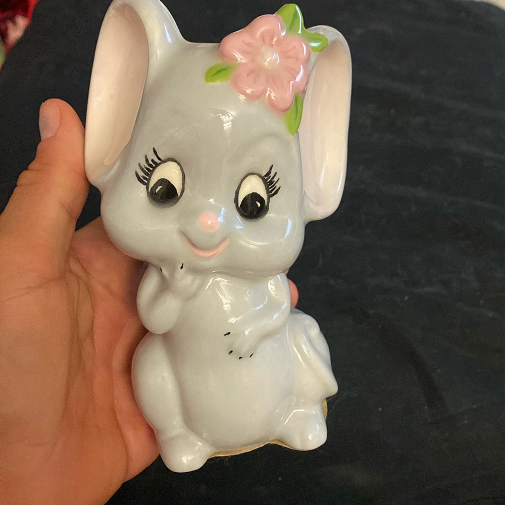 Vintage ceramic gray mouse with pink flower. Cartoon Disney style whimsy kitsch